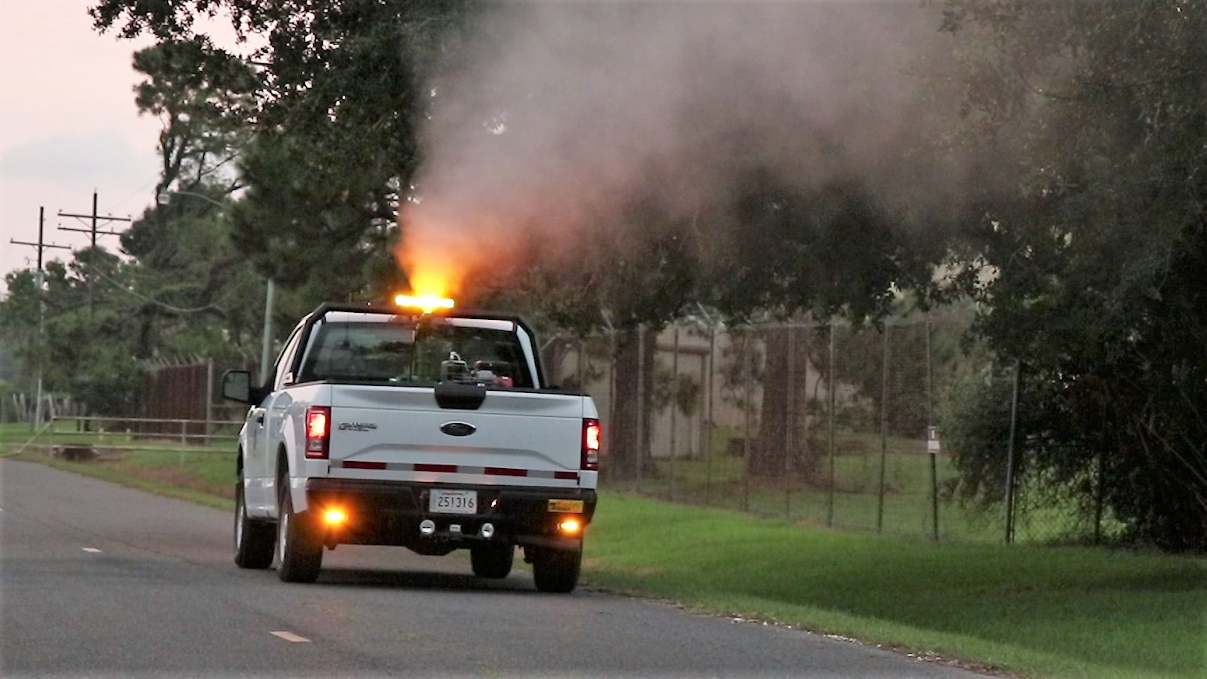 mosquito control white truck