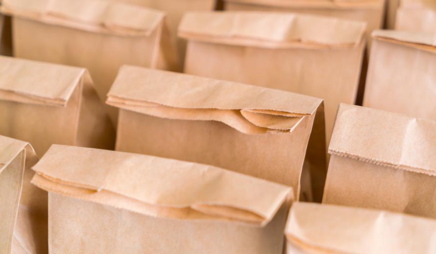 row of bagged lunches summer food service program