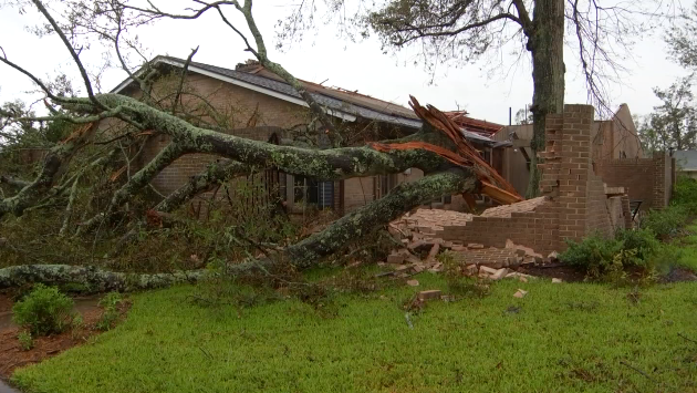 damaged home in LC