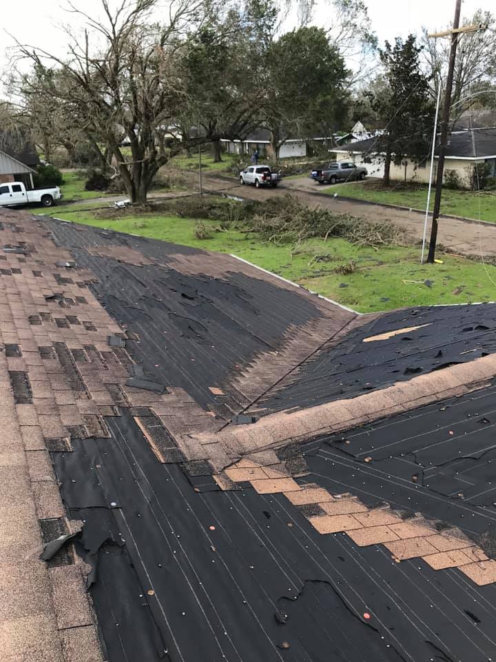 Hurricane Laura roof with most shingles missing tarpaper exposed